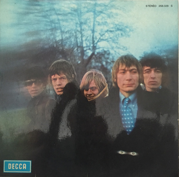 Between the buttons front cover